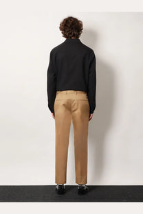 Gucci men’s beige cotton trousers with a tan straight-leg cut and belt loops