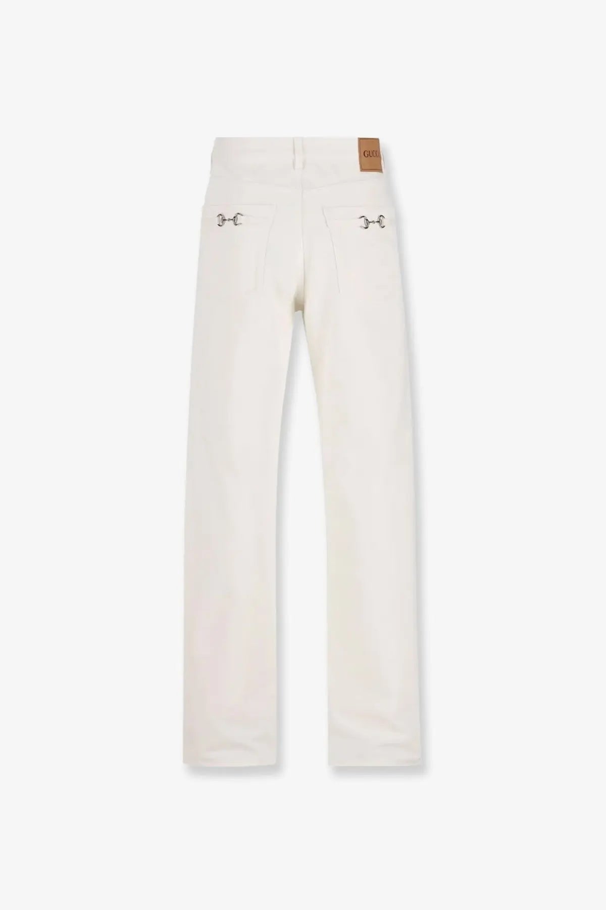 Cream-colored Gucci men’s denim trousers with horsebit logo, classic straight-leg cut, and subtle stitching details