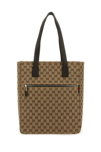 Beige and brown gucci gg supreme canvas tote bag with black leather handles for men’s fabric shopping use