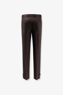 Gucci men’s brown gabardine wool trousers with dark brown tailored straight-leg cut and buttoned ankle cuffs