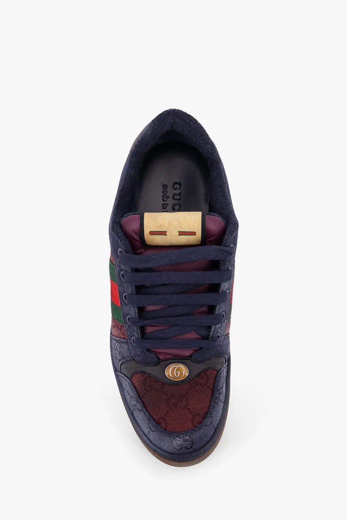 Dark blue Gucci men’s GG Bicolor fabric sneaker with burgundy green striped side panel and gold GG logo on toe cap