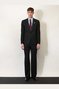 Black tailored suit with single-breasted jacket and trousers worn over gucci men’s gg cotton shirt serenity in light blue