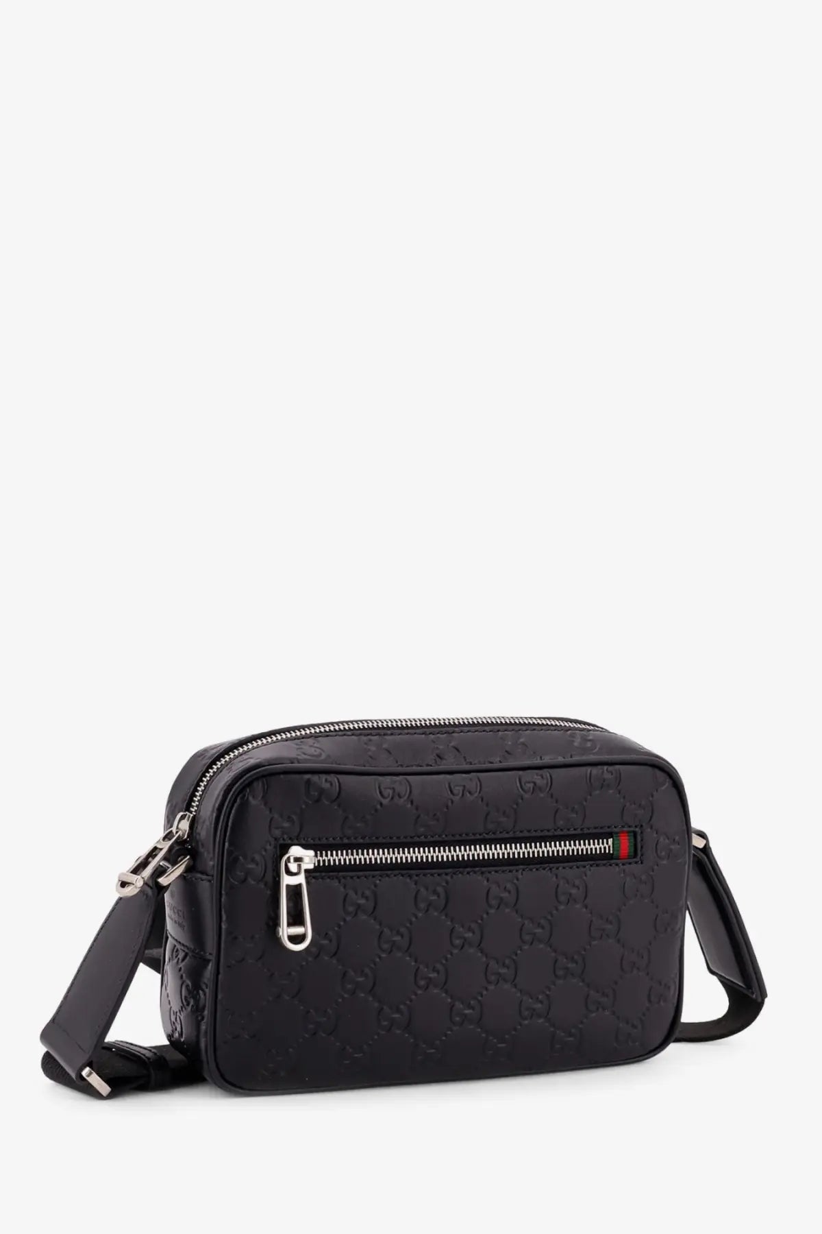Black gucci men’s gg emblem leather crossbody bag with silver hardware and red zipper pull accent