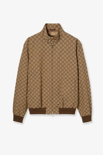 Gucci men’s beige tan fabric jacket with repeating brown interlocking gg logo pattern and ribbed cuffs