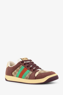 Gucci men’s brown gg fabric leather sneakers with beige and green stripes featuring the iconic gg monogram pattern