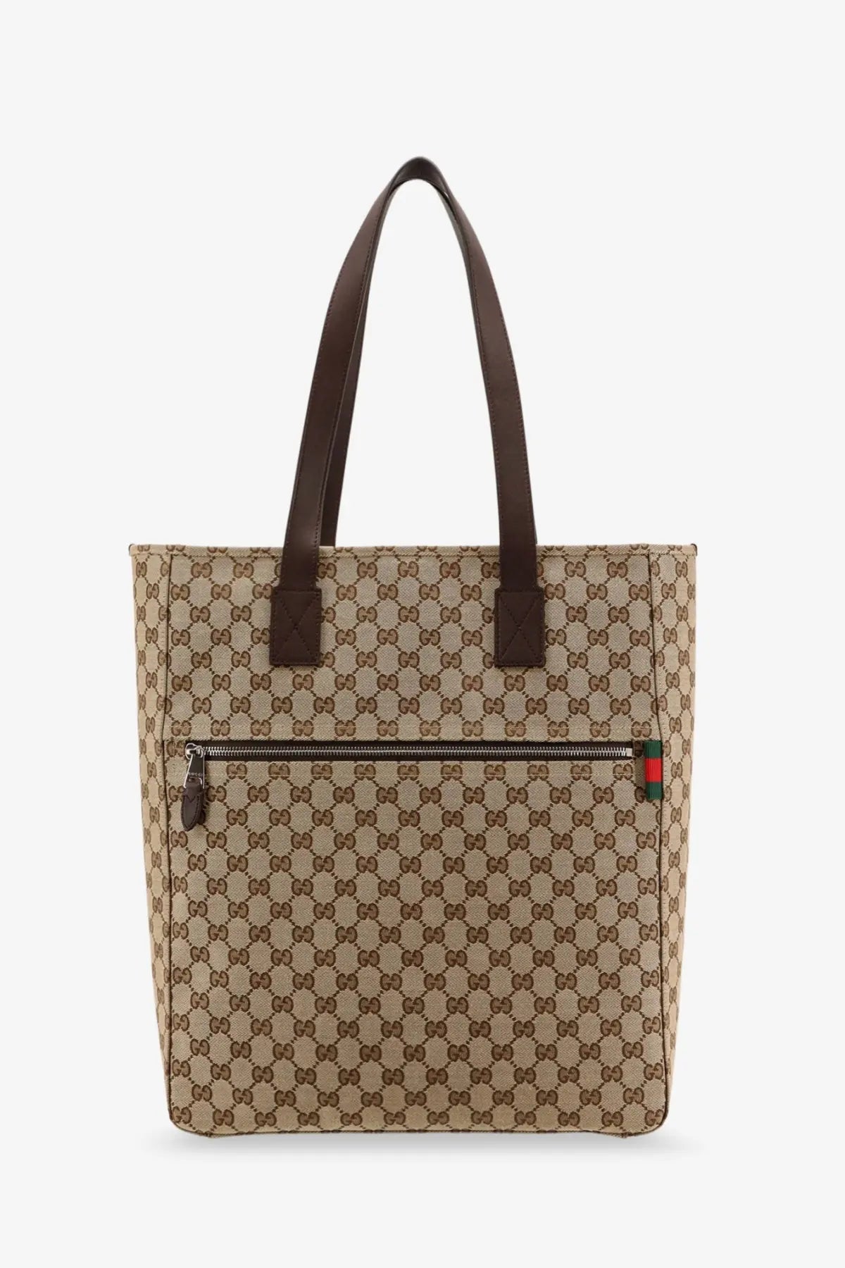 Beige and brown Gucci GG Supreme canvas tote bag with leather handles designed as a men’s shopping bag in brown