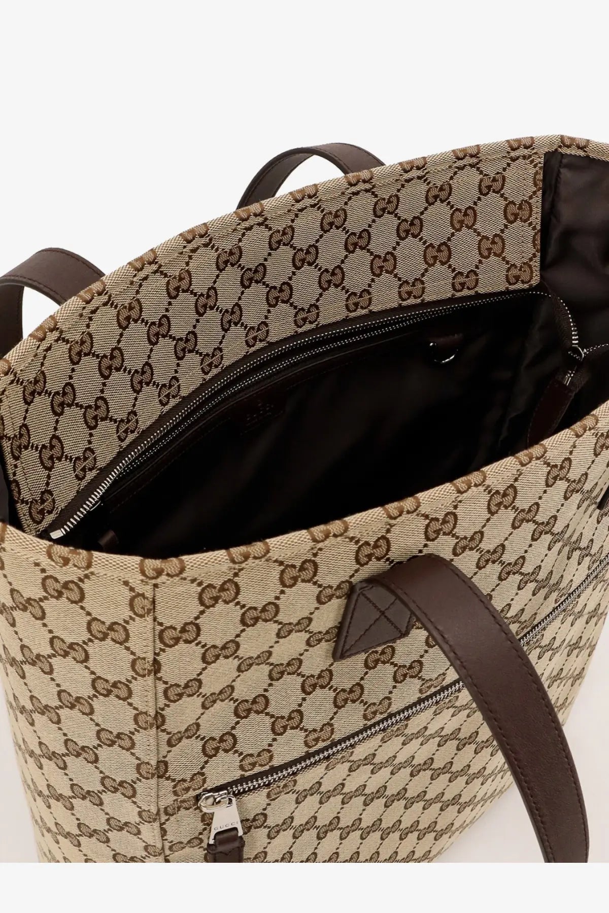 Beige and brown gucci men’s gg fabric shopping bag made of gg supreme canvas with leather handles