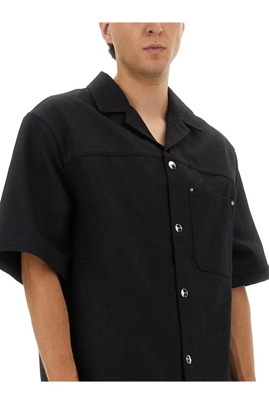 Gucci men’s black short-sleeved GG jacquard shirt with collar chest pocket and silver-toned buttons