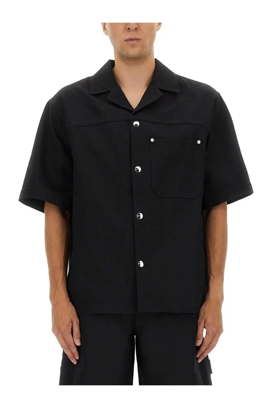Gucci men’s black GG jacquard short-sleeved shirt with silver buttons and chest pocket in cotton blend fabric