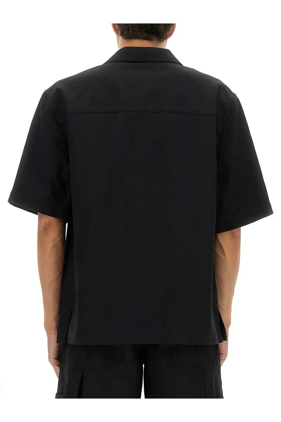 Gucci men’s black GG jacquard short-sleeved button-up shirt with structured collar and minimalist design