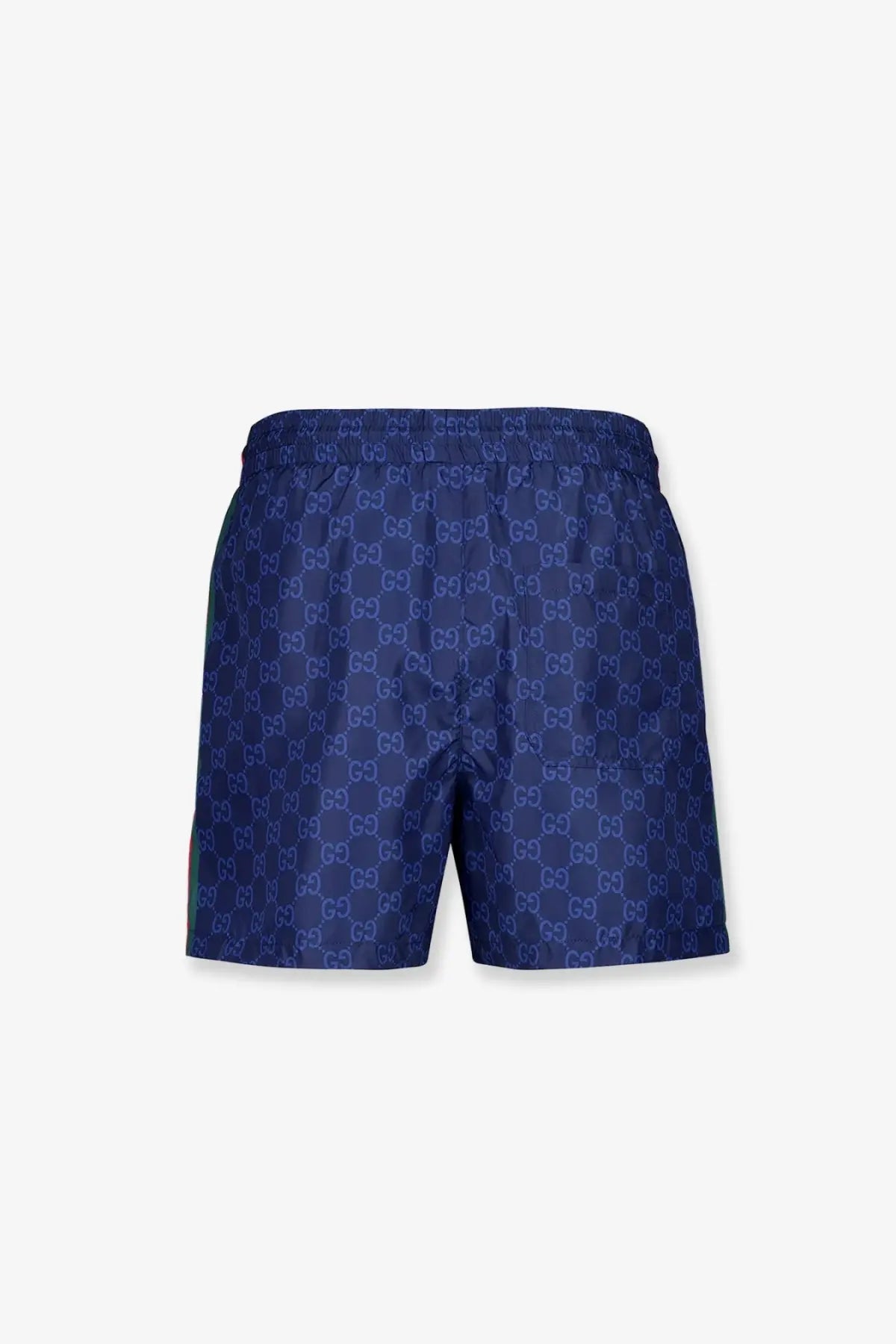 Dark blue gucci men’s nylon swim trunks with repeating interlocking gg logo pattern for swimming and beachwear