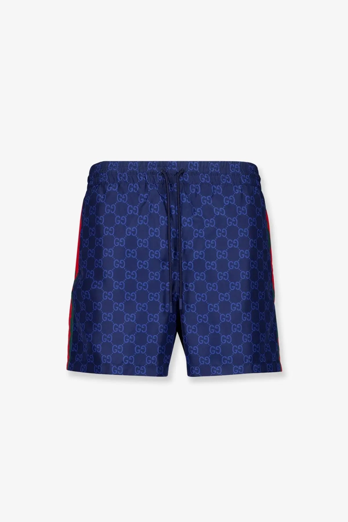 Navy blue Gucci men’s GG nylon swim trunks with repeating monogram pattern and red side stripes