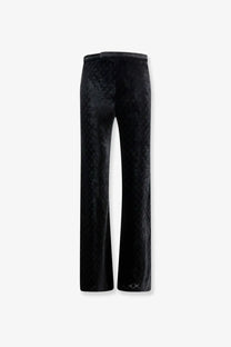 Gucci men’s black GG stretch devoré velvet trousers with subtle textured pattern and sleek straight-leg cut