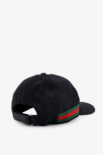 Black gucci men’s baseball hat in gg supreme fabric with subtle monogram and signature red green striped band
