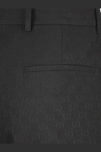 Black gucci men’s gg wool blend trousers featuring a subtle gg supreme monogram pattern and classic fit