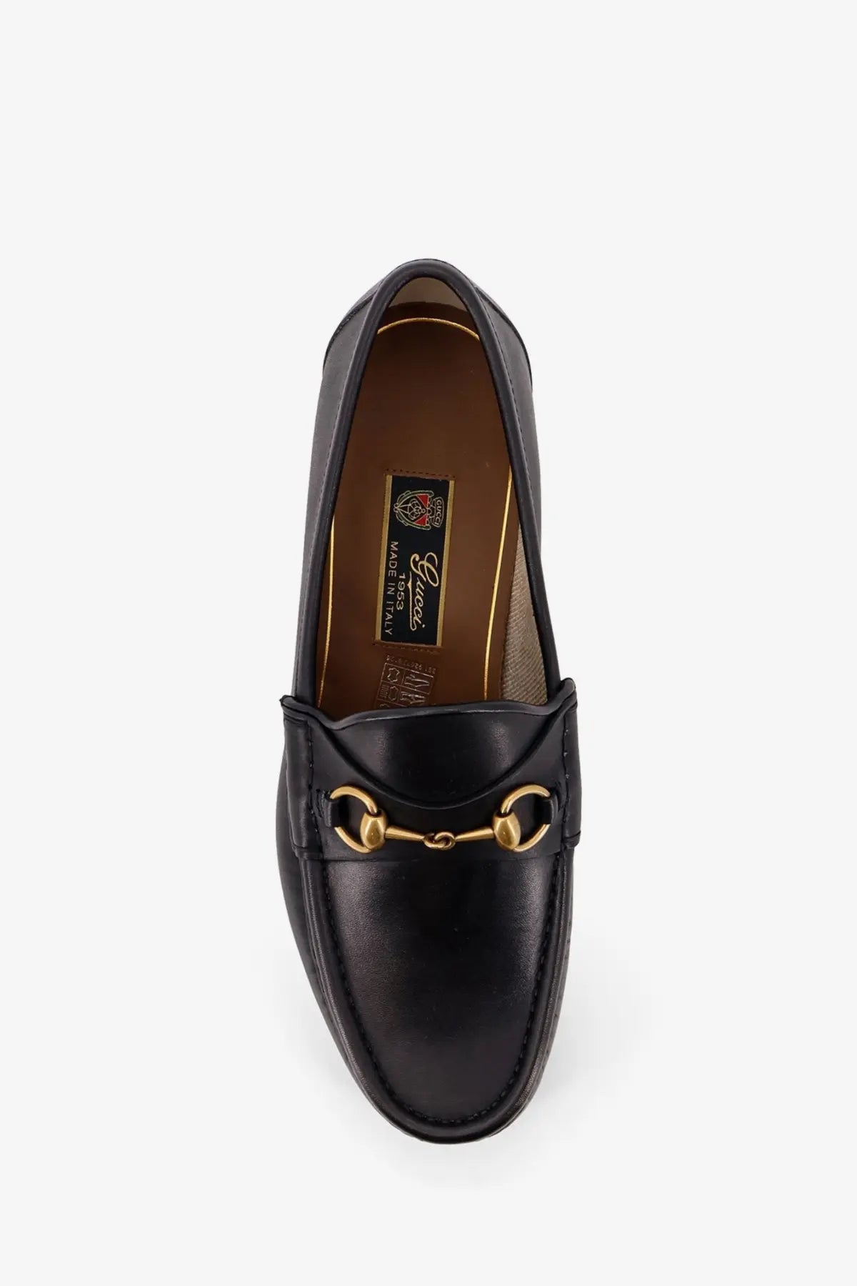 Black leather gucci men’s horsebit loafer with gold-tone horsebit detailing perfect for formal wear