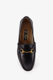Black leather gucci men’s horsebit loafer with gold-tone horsebit detailing perfect for formal wear