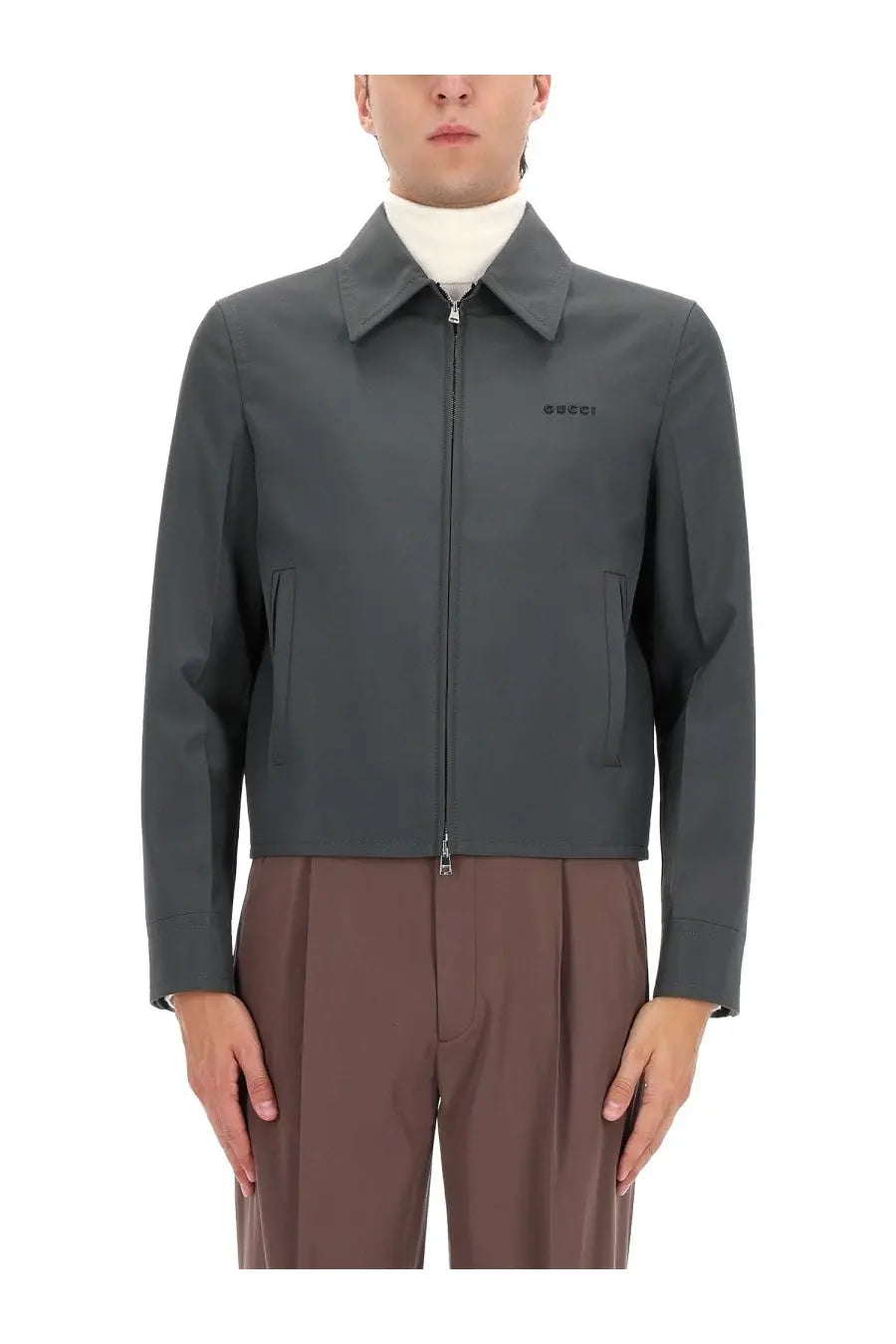 Dark gray Gucci men’s jacket with subtle embroidered logo on left chest ideal for stylish casual wear
