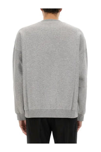 Gucci men’s grey jersey sweatshirt made of heathered cotton with a relaxed fit and ribbed cuffs