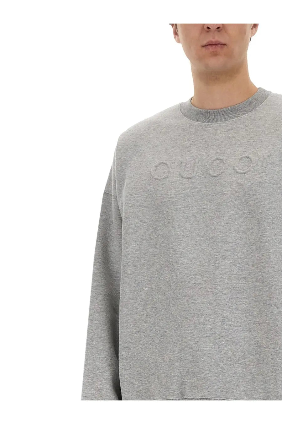 Gucci men’s grey heathered jersey sweatshirt with subtle embossed logo across the chest