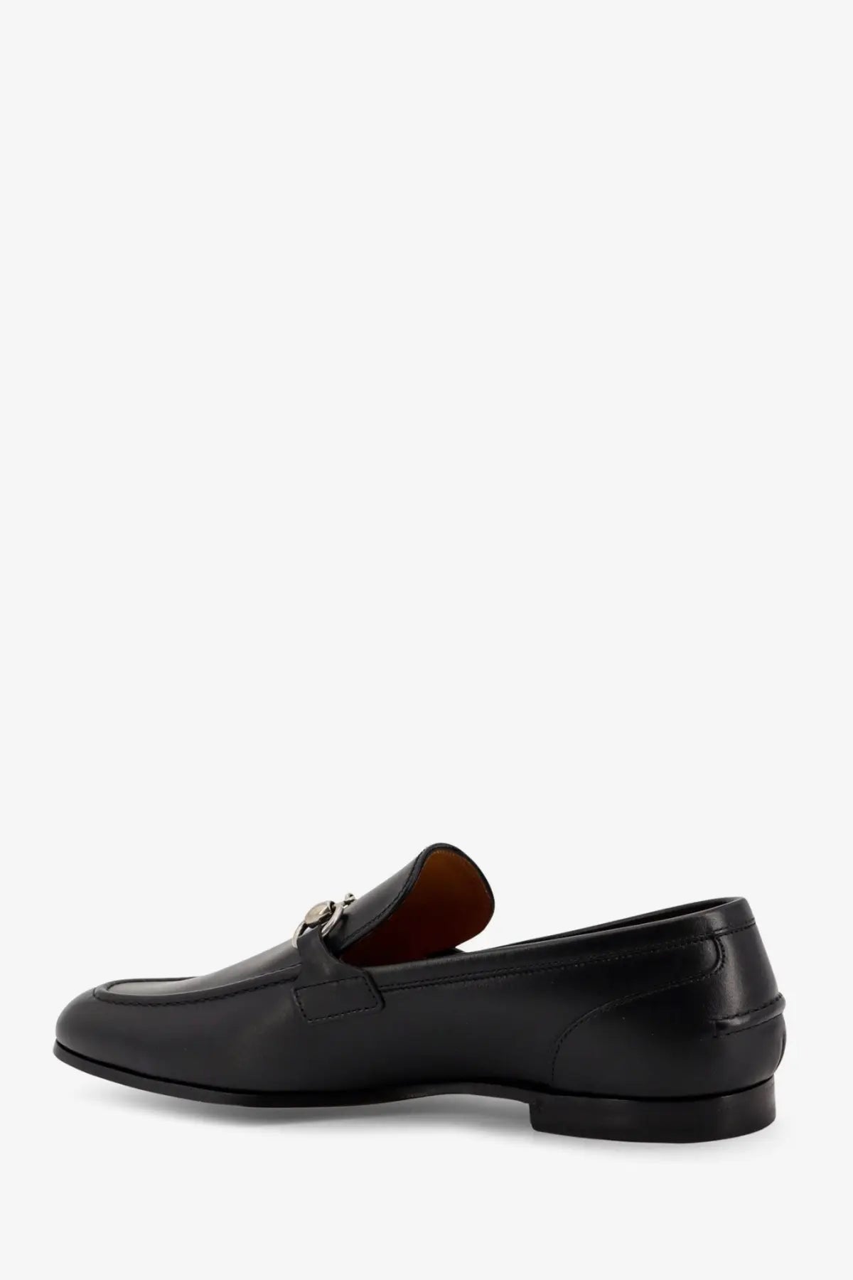 Black leather Gucci mens Jordaan loafer with silver horsebit buckle detailed on the front side