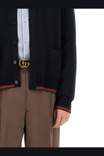 Gold-tone double-g belt buckle with interlocking logo design on black gucci men’s knitted wool cardigan