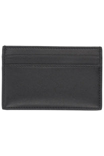 Gucci men’s black leather card holder with precise stitching and minimalist design front view