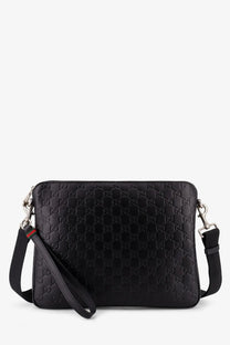 Gucci men’s black leather GG emblem crossbody bag with embossed leather, silver hardware, and detachable shoulder strap