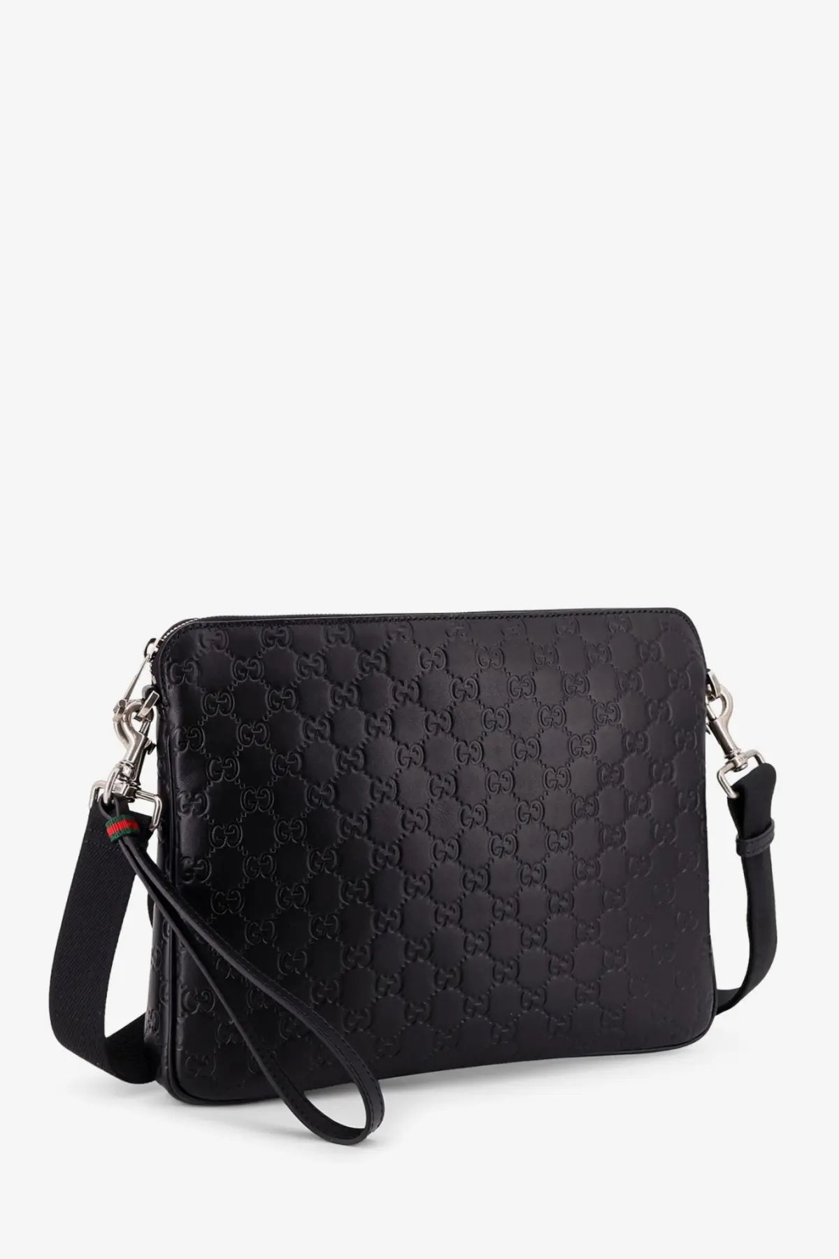 Black Gucci men’s leather GG emblem crossbody bag with embossed leather silver hardware and red clasp accent
