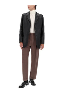 Gucci men’s black leather blazer with notched lapels and two front buttons for a stylish look