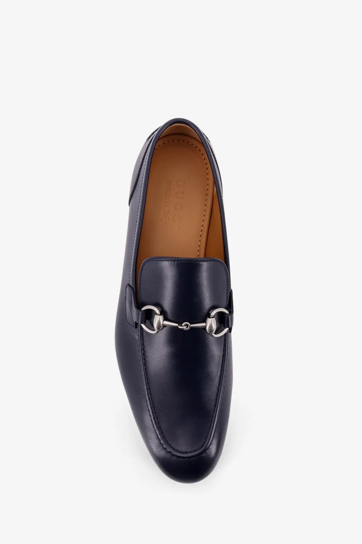 Black leather Gucci men’s loafer with silver horsebit buckle in blue product line for stylish formal wear