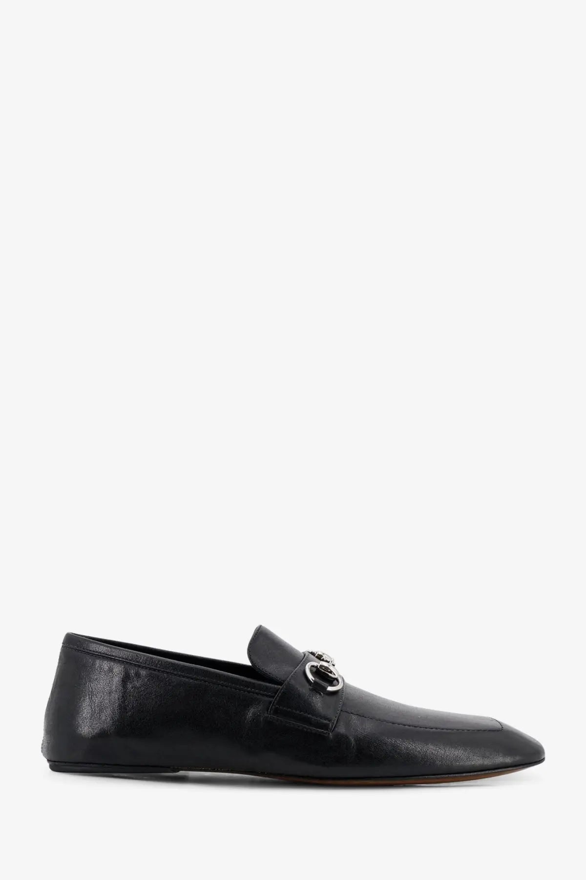 Black leather gucci men’s ragazzo loafers featuring signature metal horsebit buckle in black