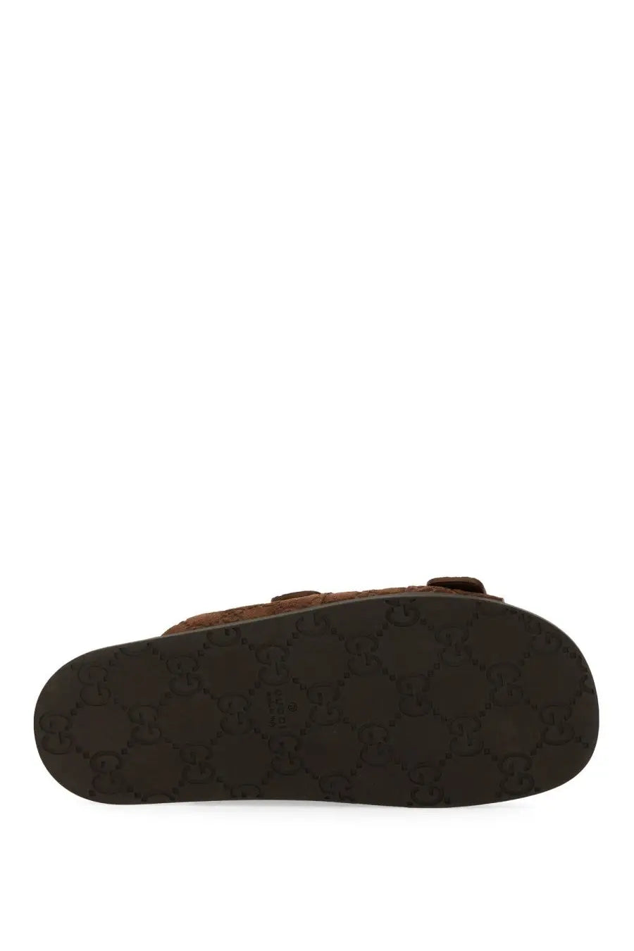 Gucci men’s brown leather slider sandal with black sole featuring signature interlocking GG pattern