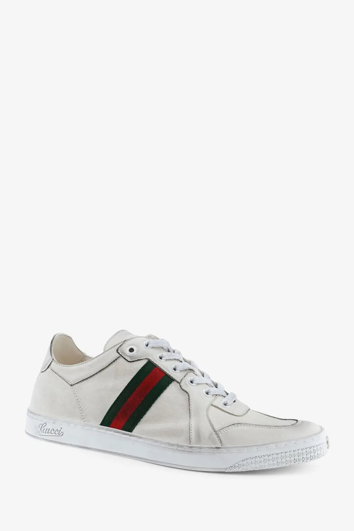 White Gucci men’s leather sneaker with red and green striped band across the side for casual wear