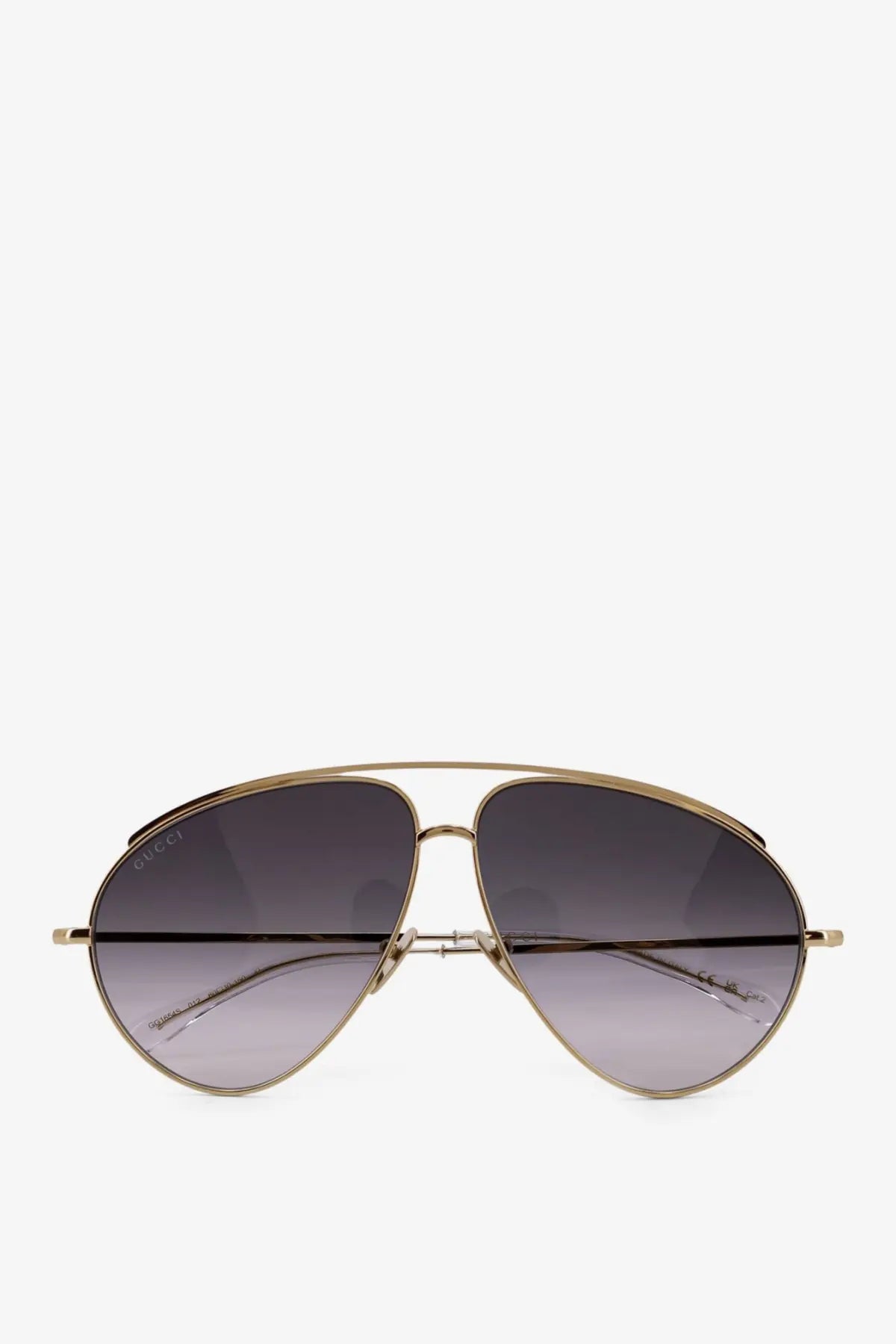 Gucci men’s metal sunglasses with gold-toned aviator frame and gradient gray lenses in a sleek minimalist design