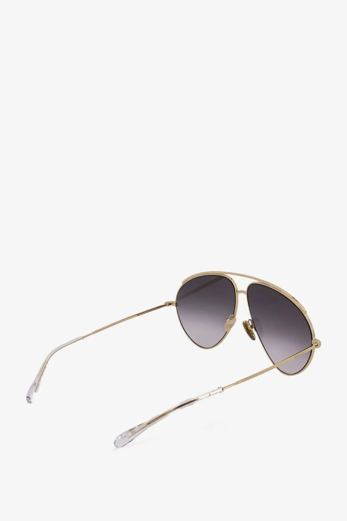 Gucci men’s metal sunglasses featuring gold-toned aviator frames and gradient gray lenses with a minimalist design