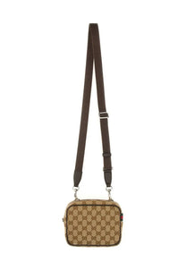 Beige and brown gucci gg supreme canvas crossbody bag with adjustable strap in men’s mini gg bag beige style