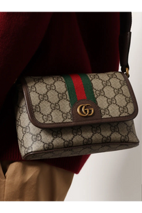 Beige and brown Gucci men’s mini Ophidia GG fabric crossbody bag with signature monogram canvas and gold hardware