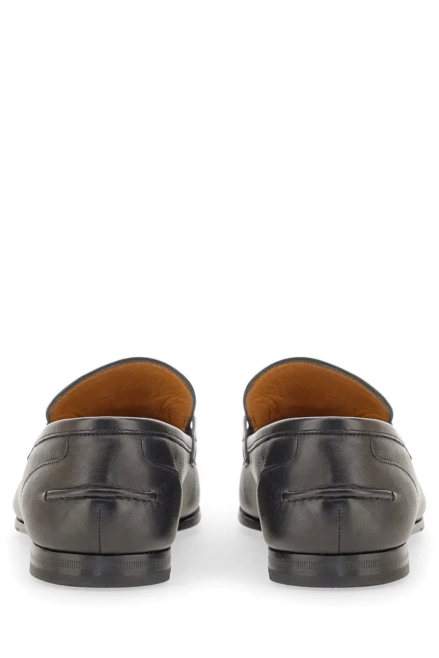 Gucci men’s moccasin Jordaan black leather loafers with smooth polished finish and contrasting tan lining