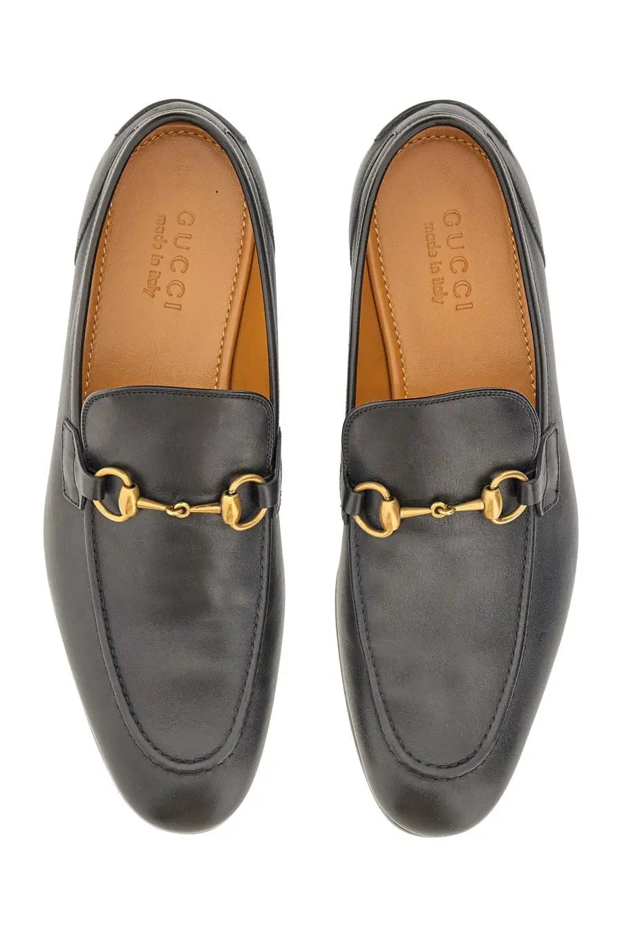 Black gucci men’s moccasin jordaan loafers with gold-tone horsebit detailing in leather