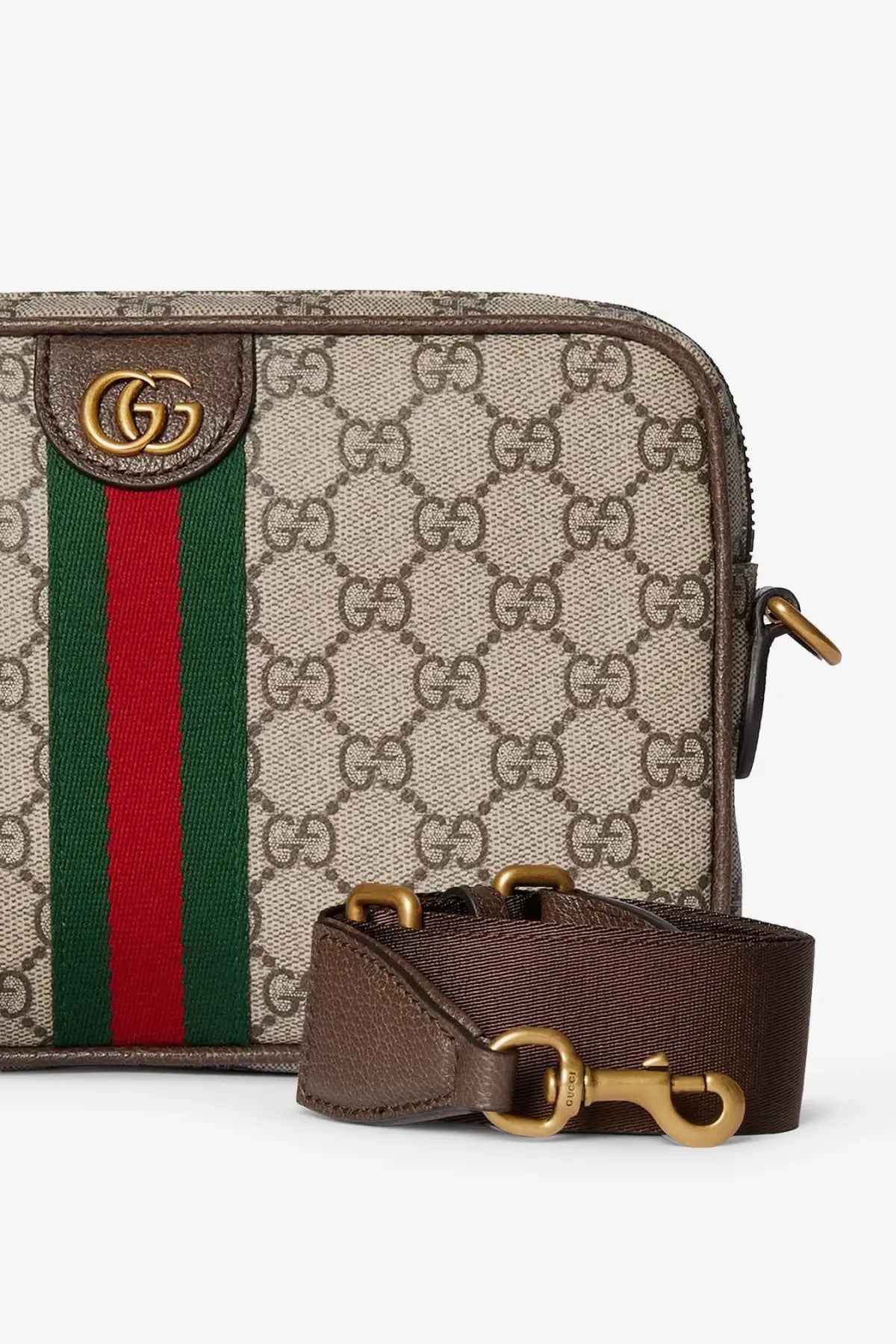 Beige and brown gucci men’s ophidia gg supreme fabric crossbody bag with red and green webbing and gold hardware