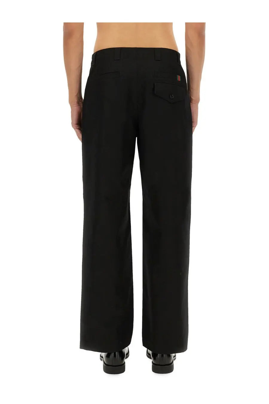 Gucci men’s black wide-leg trousers with a sleek tailored fit and subtle stitching details