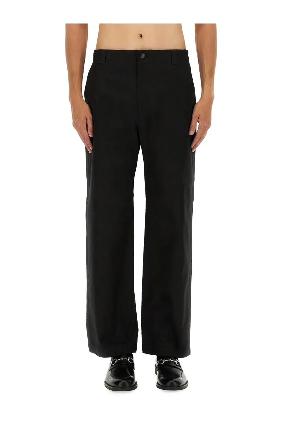 Gucci men’s black wide-leg trousers with a sleek tailored fit and subtle creases in high-quality fabric
