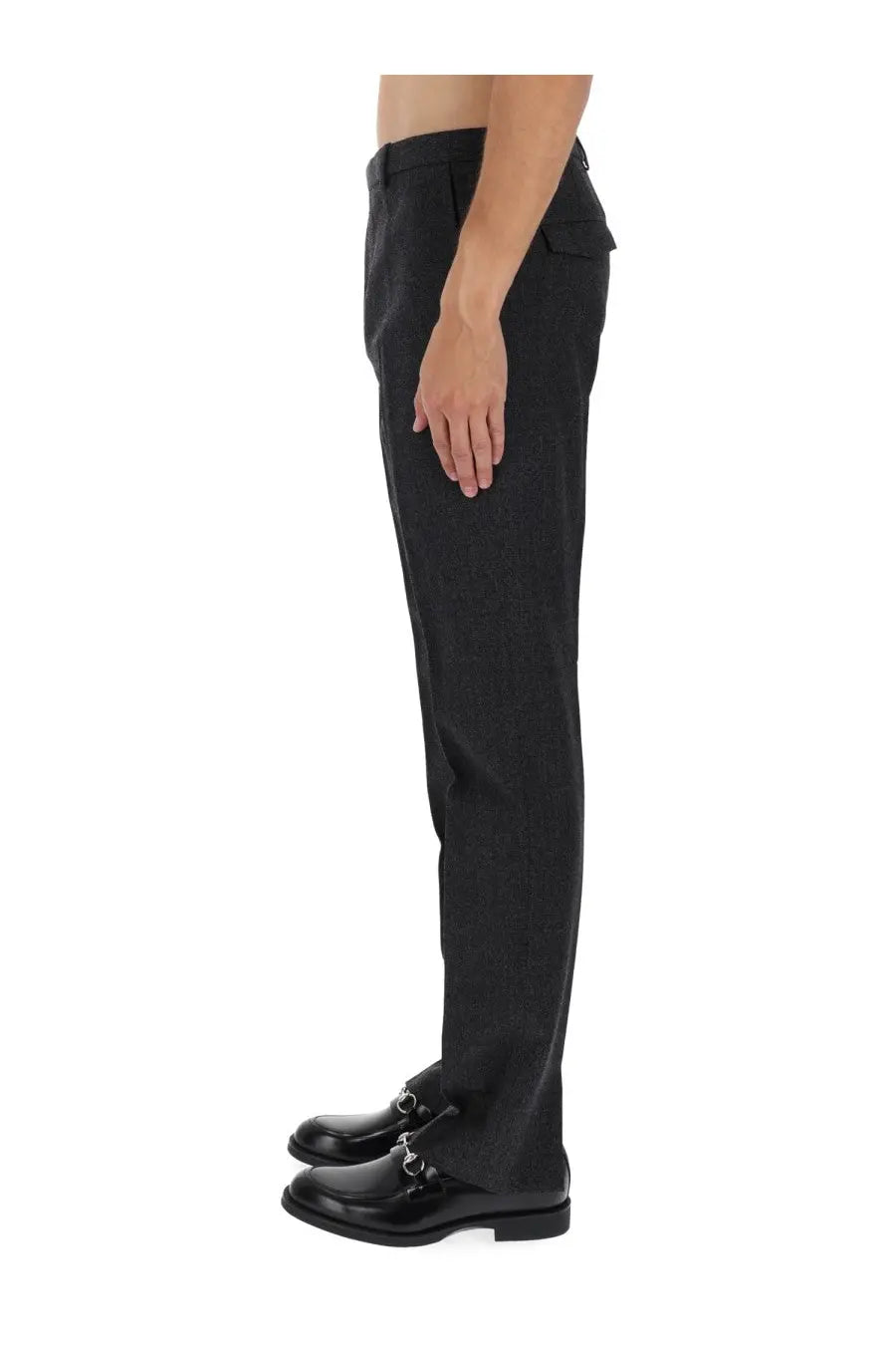 Gucci men’s mouliné grey tailored trousers with subtle textured weave and black leather loafers with silver horsebit detail