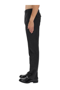 Gucci men’s mouliné grey tailored trousers with subtle textured weave and black leather loafers with silver horsebit detail