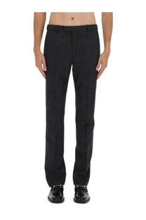 Gucci men’s black wool trousers with subtle textured weave and classic straight-leg cut in mouliné grey