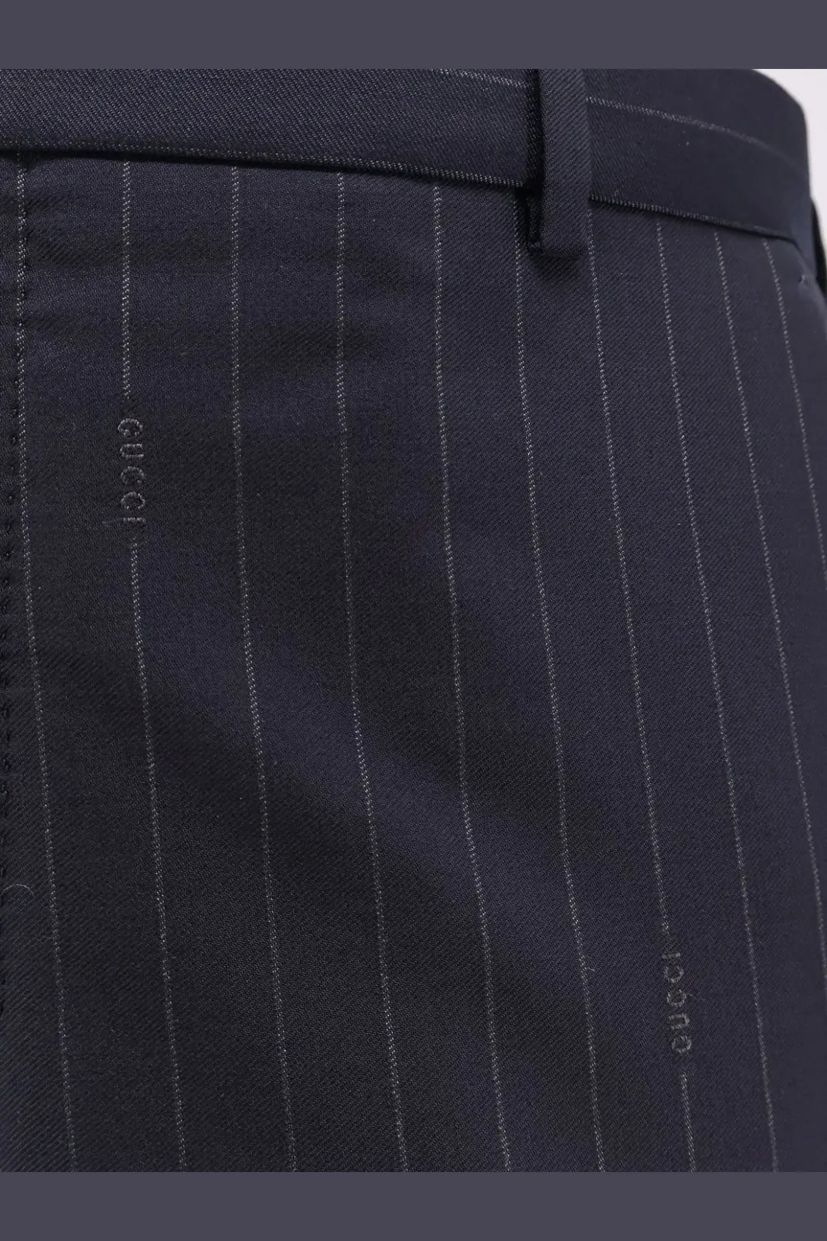 Dark navy pinstripe wool trousers with silver thread and gucci logo embroidery on the side seam for men