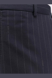 Dark navy pinstripe wool trousers with silver thread and gucci logo embroidery on the side seam for men