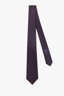 Dark purple gucci men’s pixy silk tie featuring repeating interlocking g logo pattern in blue tones
