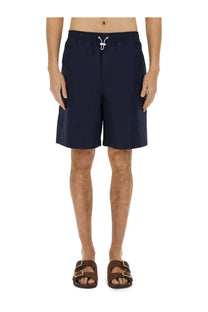 Navy blue cotton Gucci men’s poplin shorts with white drawstring tie at the waist for casual wear